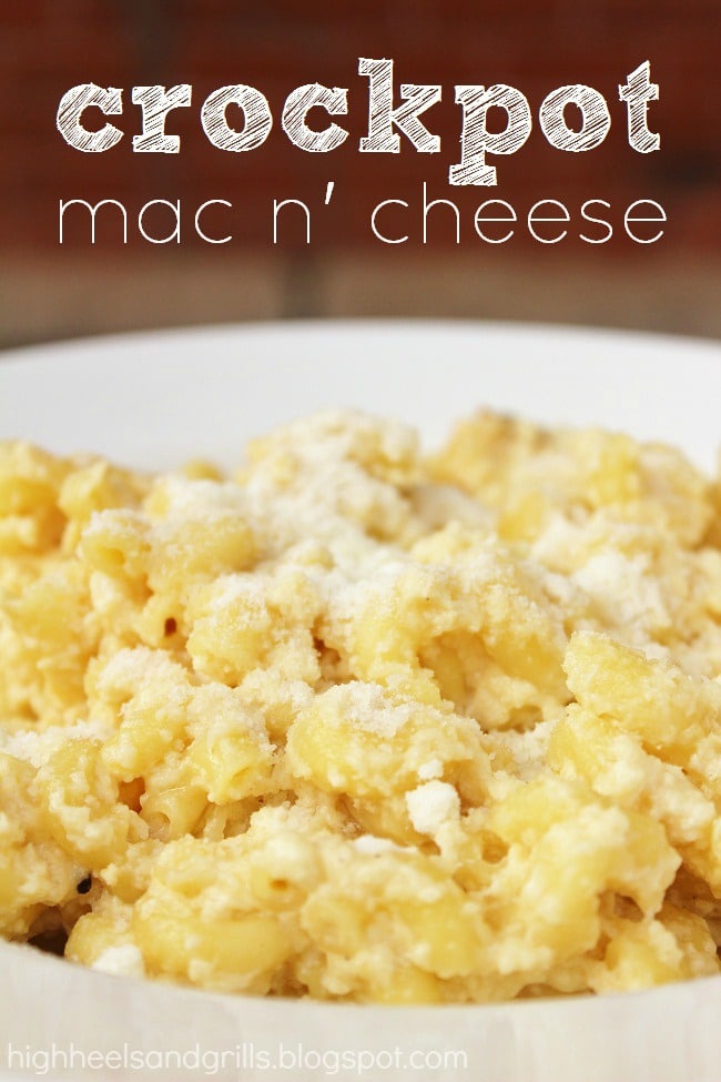 Bowl of Crockpot Mac and cheese with grated parmesan cheese on top.