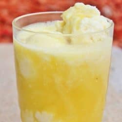 Cup of Dole Whip with pineapple juce to turn it into a float.