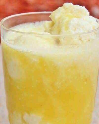 Cup of Dole Whip with pineapple juce to turn it into a float.