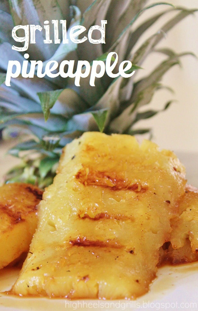 Slices of grilled pineapple on a plate.