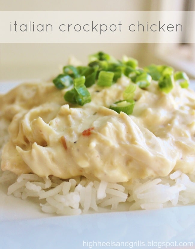 Plate of Italian Crockpot Chicken served over rice with green onions on top.