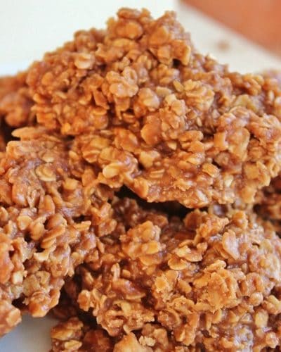 Chocolate Peanut Butter No Bake Cookies stacked up on a plate.