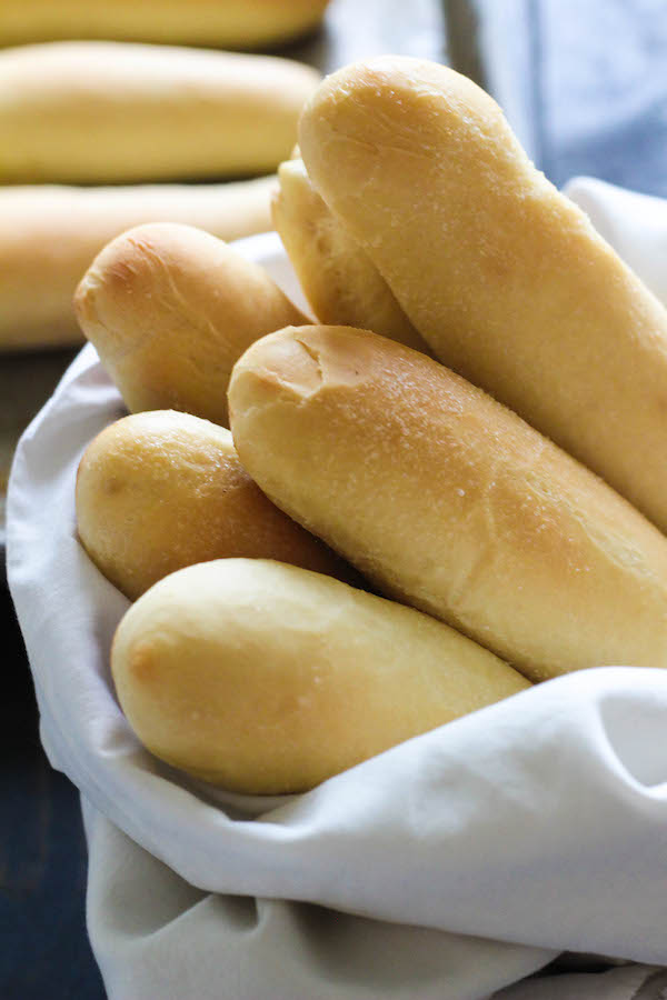 Olive Garden Breadsticks Copycat. These are light and fluffy, but crisp on the outside and have a slight hint of garlic to them. Awesome side for dinner! highheelsandgrills.com