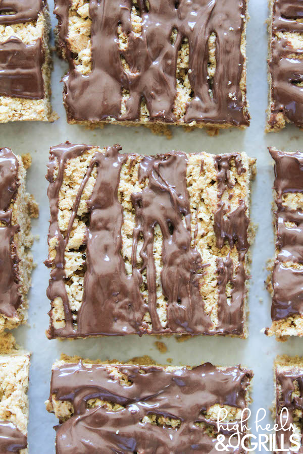 Smores Krispy Treats Recipe - Made from graham cracker crumbs instead of cereal. They taste just like a smore! Such a fun and easy, no bake, summer treat. https://www.highheelsandgrills.com/smores-krispy-treats/