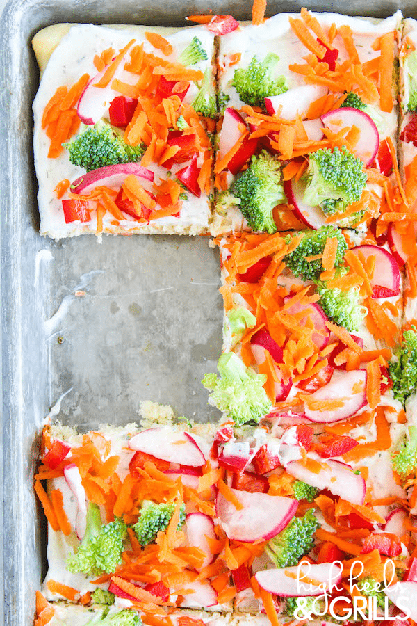 Ranch Cream Cheese Vegetable Pizza - We made this for my daughter's birthday party and everyone loved it! It's so easy to make and tastes amazing! https://www.highheelsandgrills.com/ranch-cream-cheese-vegetable-pizza #NaturallyClean #ad