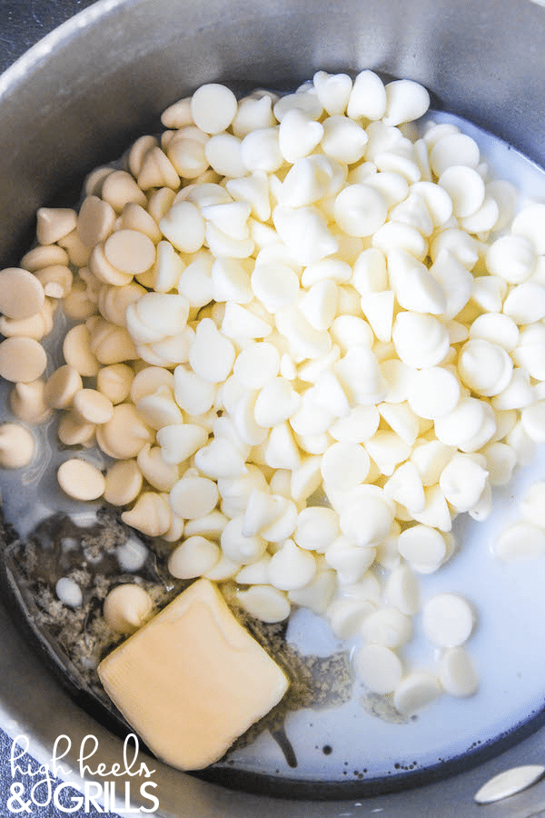 Cookies and Cream Smores Dip - Melted white chocolate chips, crushed Oreos, and toasted marshmallows. Dip with graham crackers to fully enjoy this amazing dessert! https://www.highheelsandgrills.com/cookies-and-cream-smores-dip/