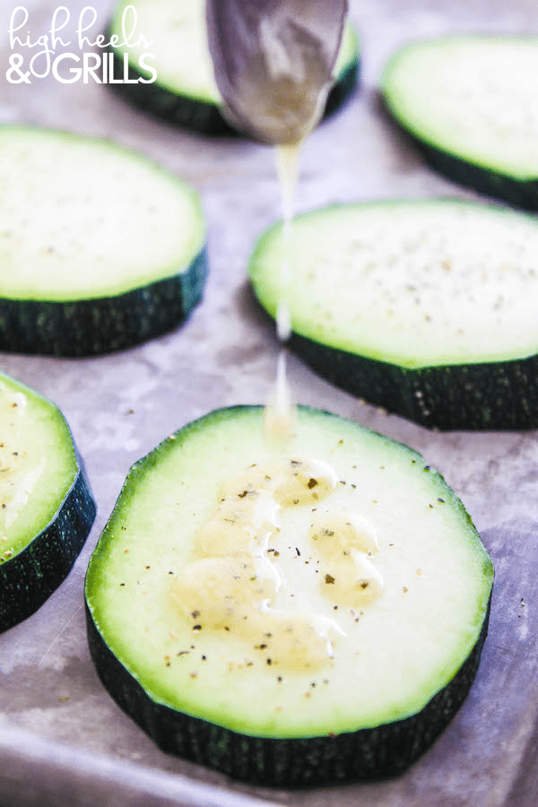 These Grilled Three Cheese Garlic Zucchini Rounds are the only way to eat zucchini. They are ridiculously easy to throw together and taste so good. 