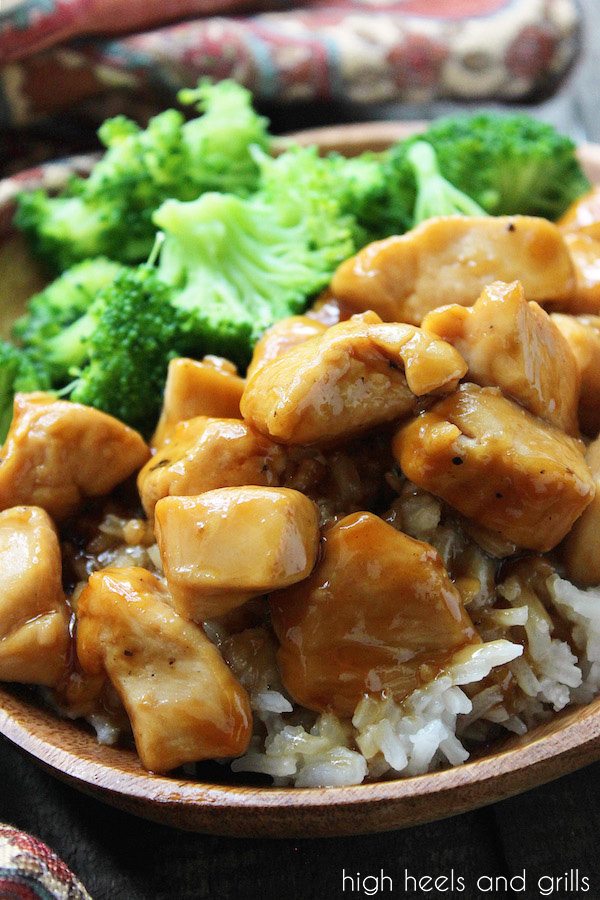 Easy Chicken Teriyaki plated on top of rice, with broccoli.