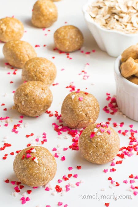 Batch of Skinny No Bake Sugar Cookie Energy Bites with heart shaped sprinkles