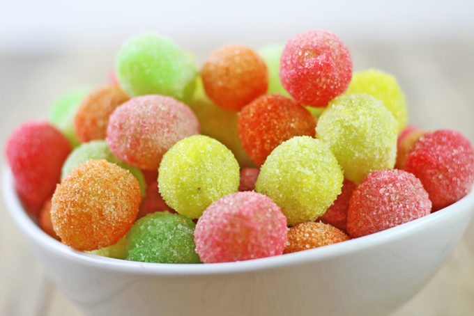 Bowl full of colorful Sour Patch Grapes - Best Skinny Dessert Recipes