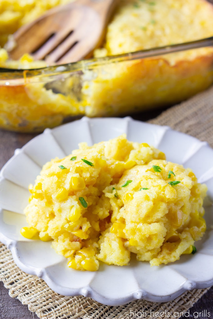 A side view of this easy corn casserole recipe, dished up onto a plate.