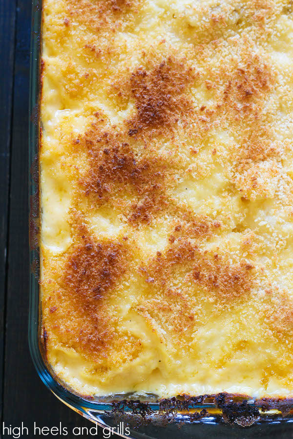 Cheesy Scalloped Potatoes - cheesy, easy to make, and the Panko bread crumbs on top give it the perfect hint of crunchiness! https://www.highheelsandgrills.com/cheesy-scalloped-potatoes/